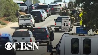 Multiple officers wounded, "suspect down" after police shootout in central California