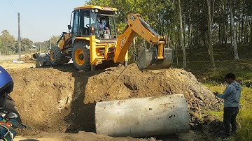 Installing Culvert Pipe in Drain - JCB Backhoe Lifting Heavy Culvert Pipe - Rural Area Road Making