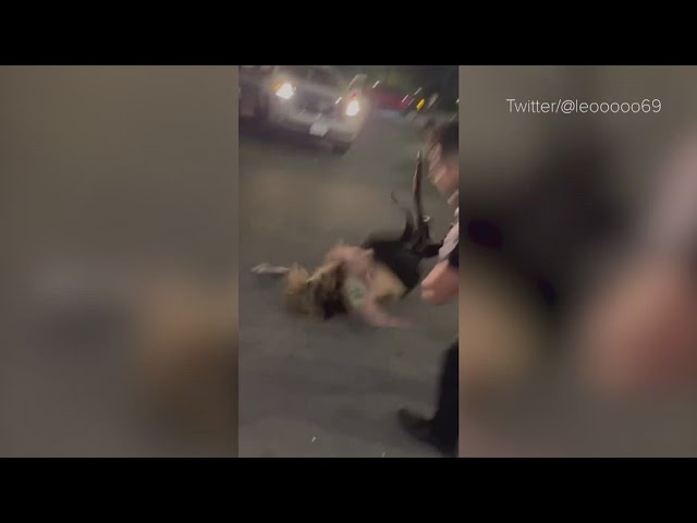 Viral video shows security guard slamming woman to the pavement in parking lot brawl class=