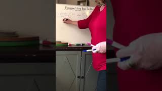 Dividing using base ten blocks