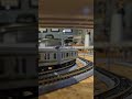 E233 Series Yokohama Line Passing Under a Bridge