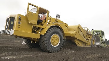 Terex S24 Scraper getting a push from a Terex 82-80 Bulldozer