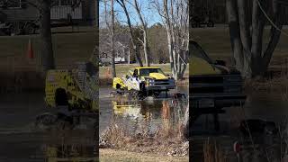 Little Saturday drive across pond on over 6 foot tall monster truck tires #megatruck #liftedtrucks