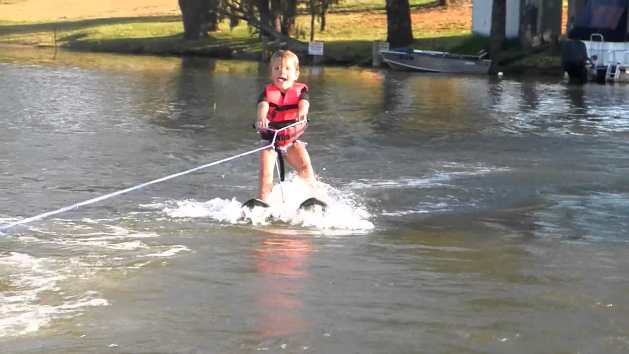 water skiing, 4 year old water skiing first attempt, Water Skiing Tricks,.....