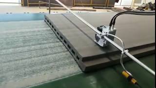 Batch Coding Inkjet Marking Machine printing QR Code Date Time on the Board.