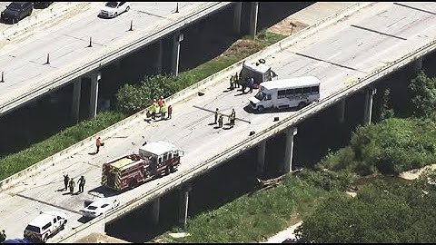 Two dead, 21 injured in massive crash on I-35