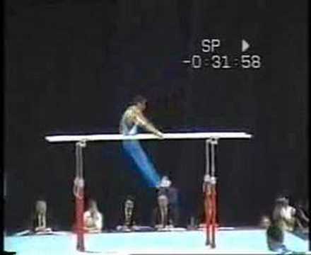 parallel bar.basket to handstand + 180