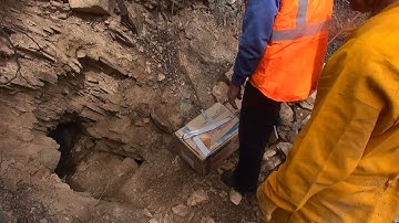 Using explosives to close off a dangerous old mine adit.