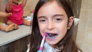 Emily Brushing her Teeth with Black Toothpaste