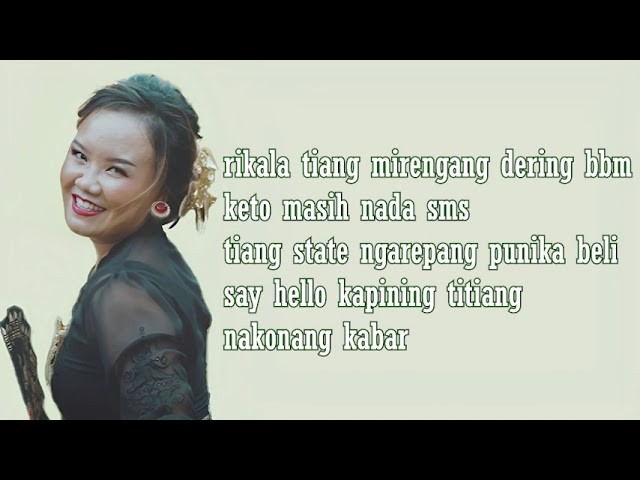 Dek Ulik – Tiang Demen  ( Official lirik Video) class=
