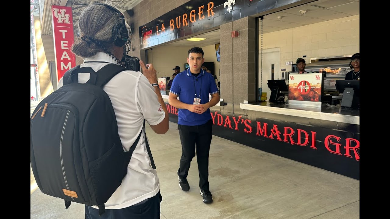 Andy Yanez sampling concessions at TDECU Stadium