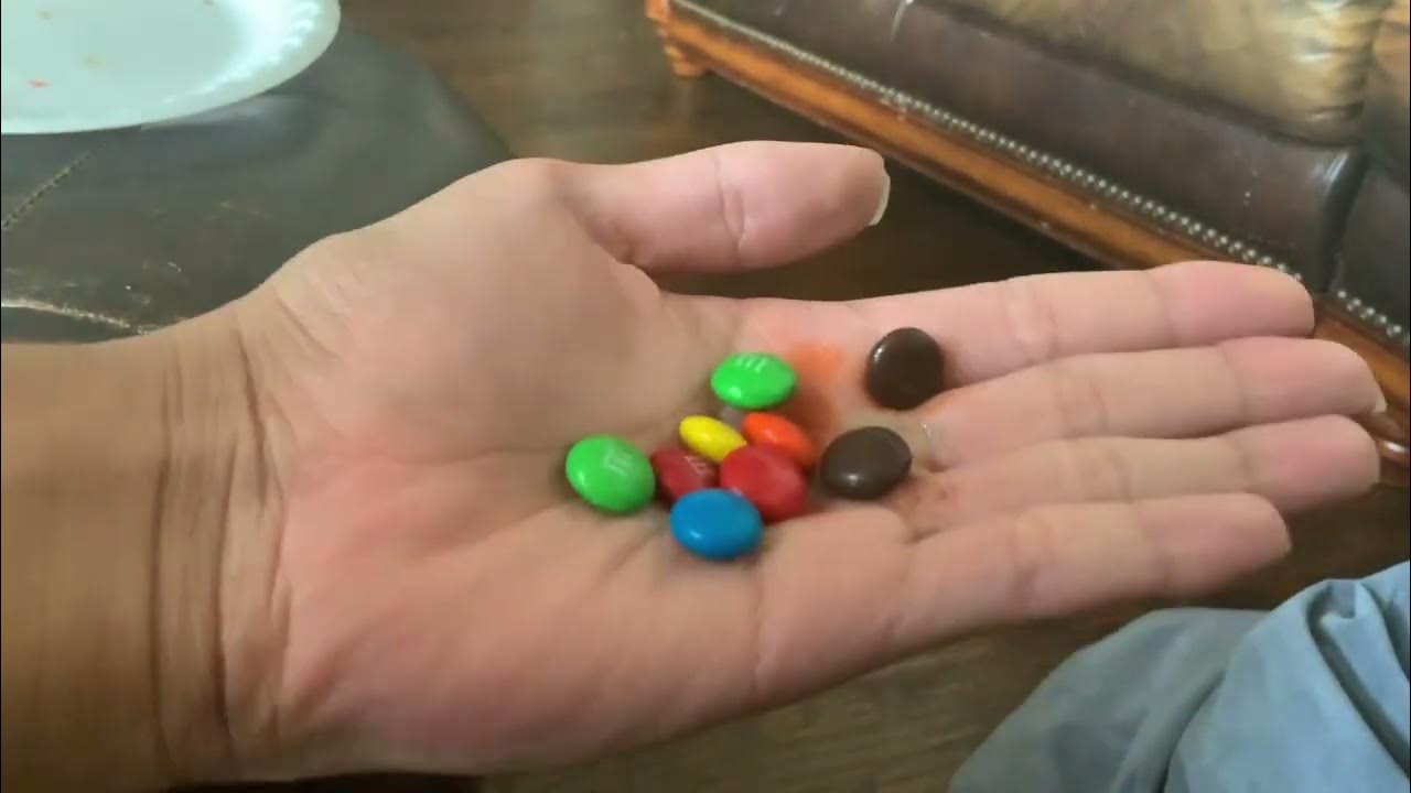 M and Ms melt in your hand. YES THE SHELL NOT THE CHOCOLATE!!! - YouTube