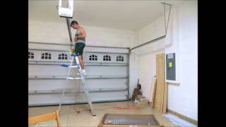 Time-lapsed installation of ceiling mounted shelves Installation of VersaRac Ceiling Storage Rack (bought from Home Depot). The VersaRac is noticeably more sturdy than the Hyloft ...