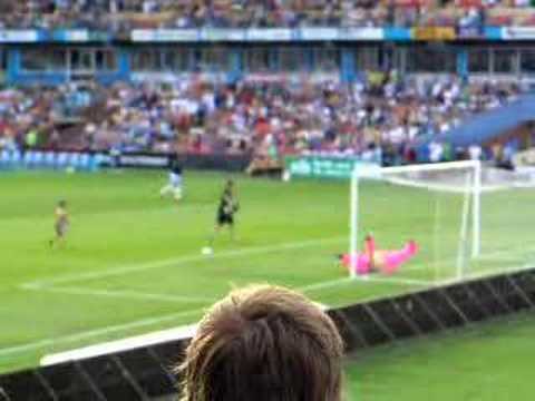 At the game between the Newcastle Jets and Sydney FC at EnergyAustralia Stadium on 1st January 2007, a guy dressed in a pig suit (later found out to be named Pinky Pig) was saving penalties at half time and happened to make this handy save.