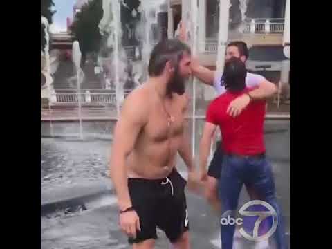 Capitals players dive into the fountain at the Georgetown Waterfront