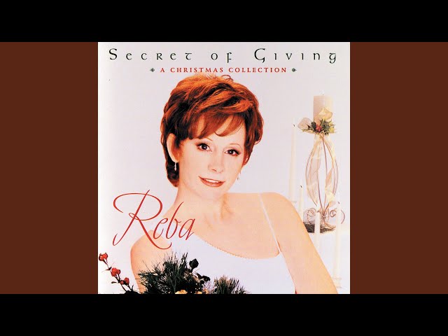 Reba McEntire - I saw Mama kissing Santa