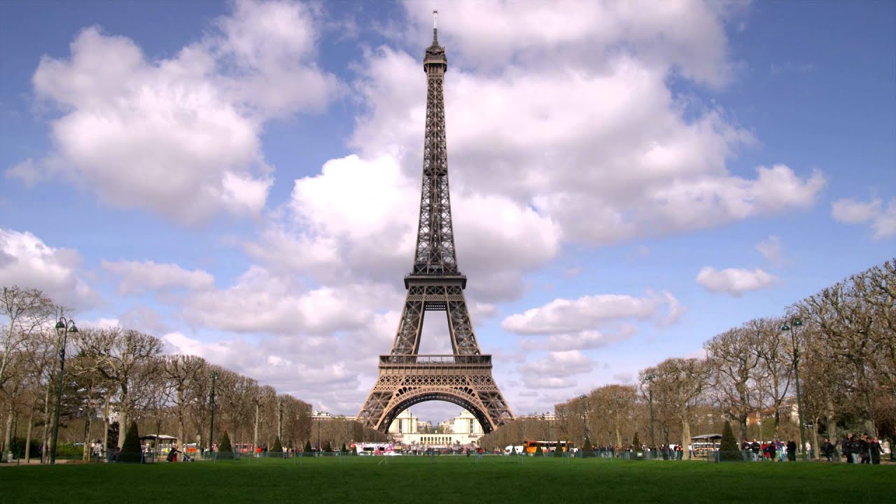 Eiffel tower with clouds in the background. - YouTube