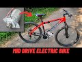 Mid drive electric bike using power steering motor