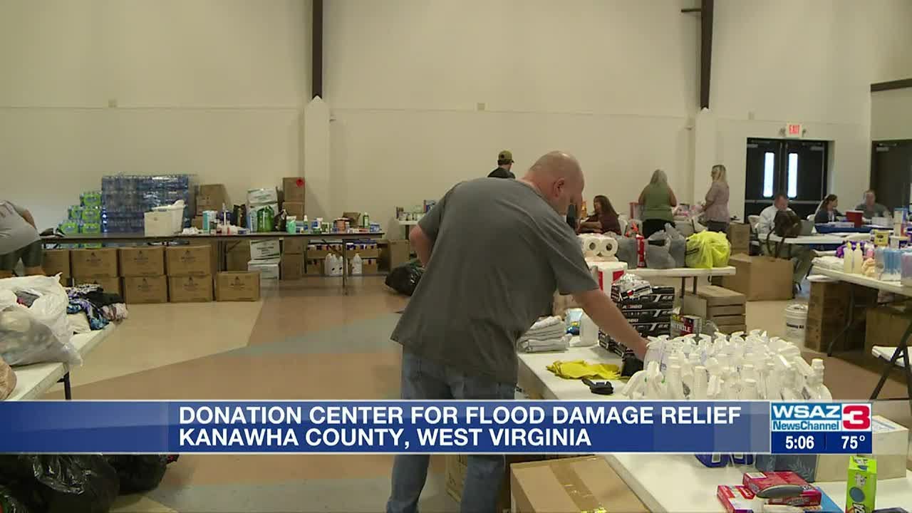 Volunteers come together to help flood victims - YouTube