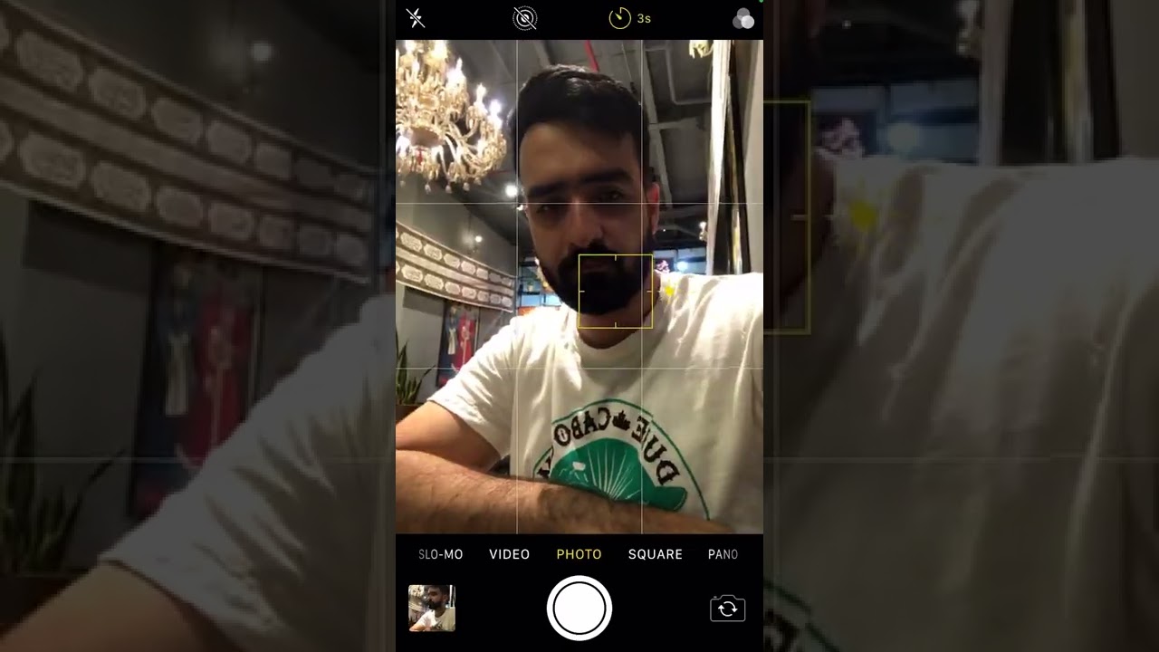 Interesting idea of taking a selfie in a cafe with a mobile phone