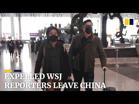 Expelled Wall Street Journal reporters leave China after headline row