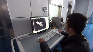 Wireless flat panel detector demonstration in IDC company R&D center.