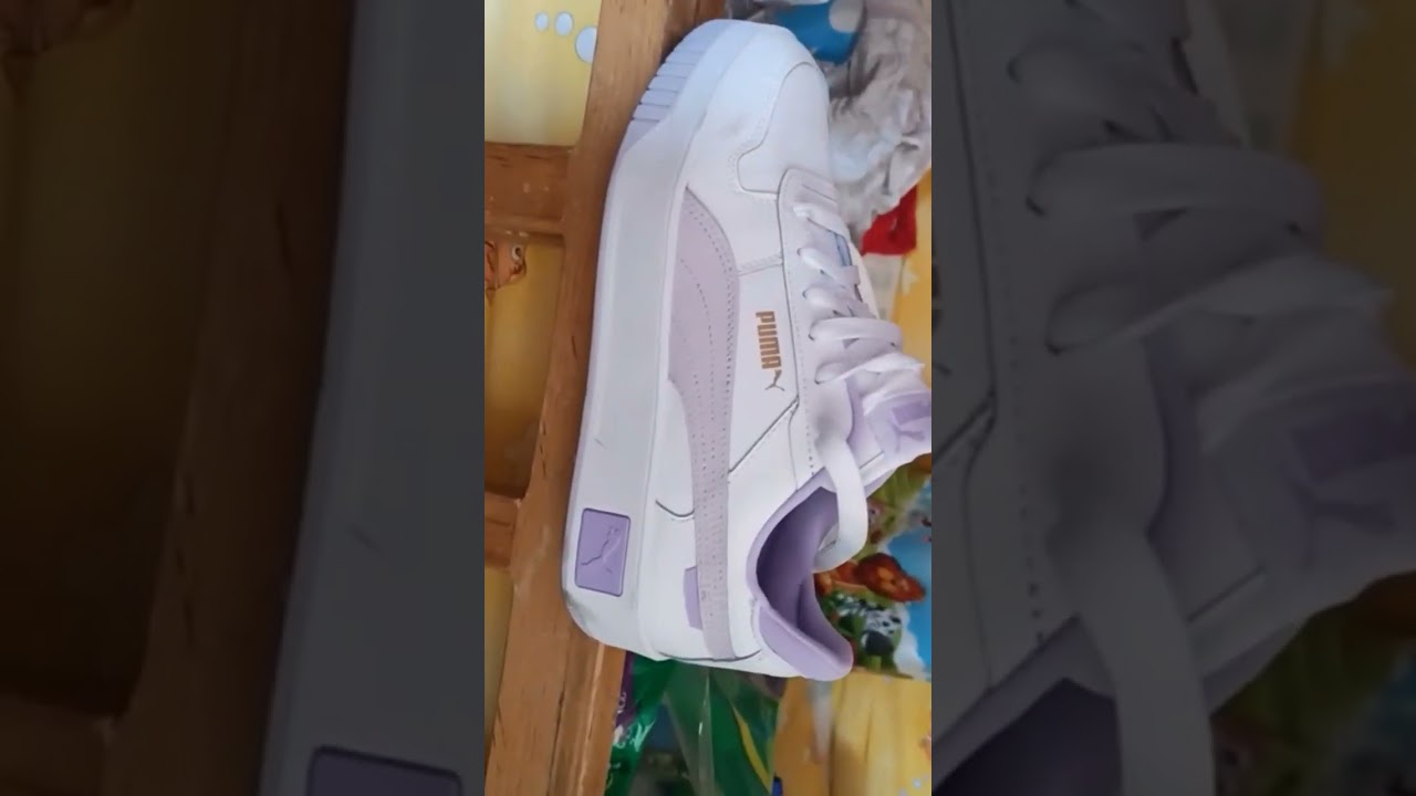 PUMA Women's Carina Sneaker Buy Now/  