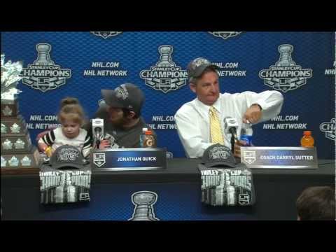 Jonathan Quick and daughter, Darryl Sutter post-ga...