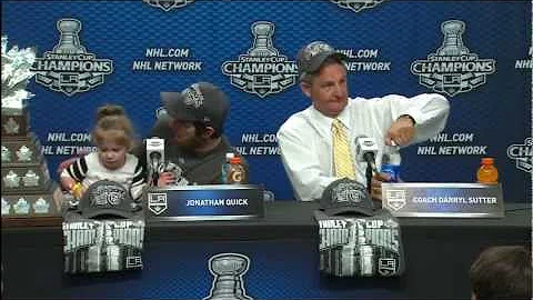 Jonathan Quick and daughter, Darryl Sutter post-ga...