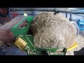 Rebaling Straw with the Hustler Bale Unroller!