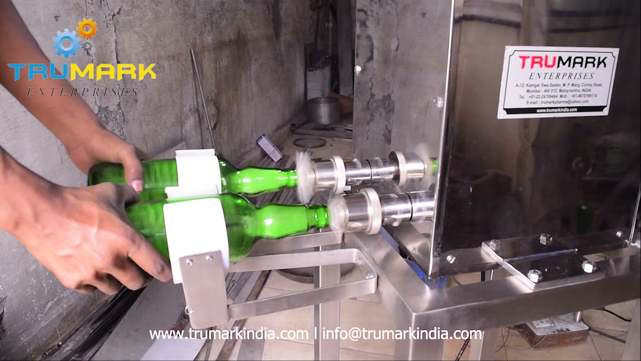 BOTTLE  WASHING MACHINE - BRUSHING AND RINSING with water