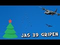 JAS 39 Gripen Christmas Tree formation(just above me) + C 130