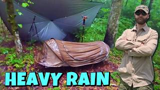 HEAVY RAIN CAMP IN EXFIL BIVY SHELTER