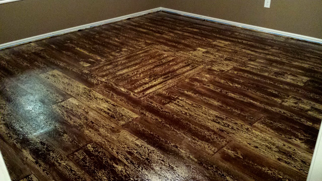 How do you paint wood subfloors?