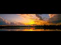 Super wide 32:9 storm clouds at sunset time-lapse. 8K HDR. AV1.