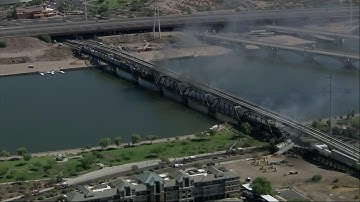 Arizona train derailment causes bridge collapse, fire