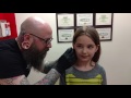 Seven year old gets her ears pierced, needle method