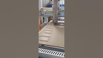 ATC Wood Cutting cnc router machine with 12 tools for cabinet door and kitchen furniture making.