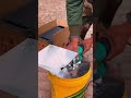 assembly process on a corn grinder which is placed on top of a bucket #automobile