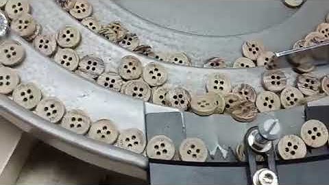 Logo Button in shirts production with BK-17 Button Feeder