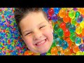Caleb grows orbeez with aubrey giant orbeez balloon pops on trampoline caleb pretend play fun