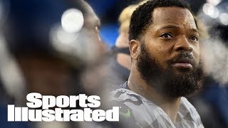 Seattle Seahawks' Michael Bennett Sits During National Anthem | SI Wire | Sports Illustrated