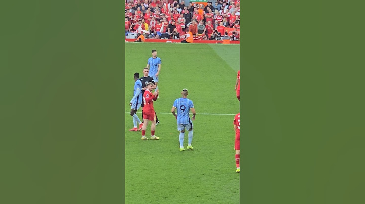 HARVEY ELLIOTT GESTURES TO RICHARLISON: Liverpool v Tottenham at Anfield