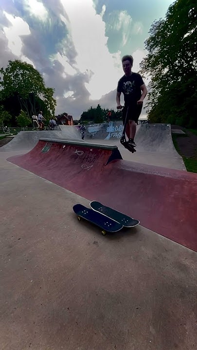 Jumping over to skateboards slo-mo #skatepark #scootering #scoot - YouTube