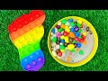 Oddly satisfying l candy mixing with magic pop it  rainbow balls playdoh cutting asmr