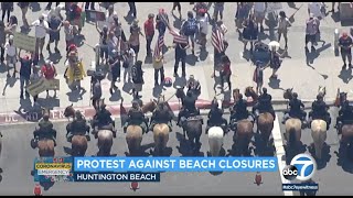 Large crowds gathered in huntington beach packed closer than six feet
to protest gov. gavin newsom's stay-at-home orders and closure. full
story: https...