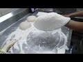 Slapping Pizza Dough