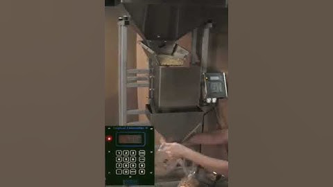 Popcorn Filling Machine -- Logical Machines S-4 weigh fill system demonstration: 6 lb popcorn