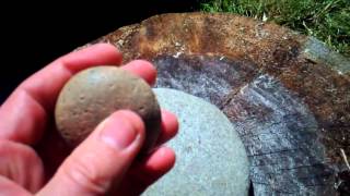 Neolithic Flat round grinding stone.AVI