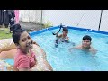 The siblings in the pool
